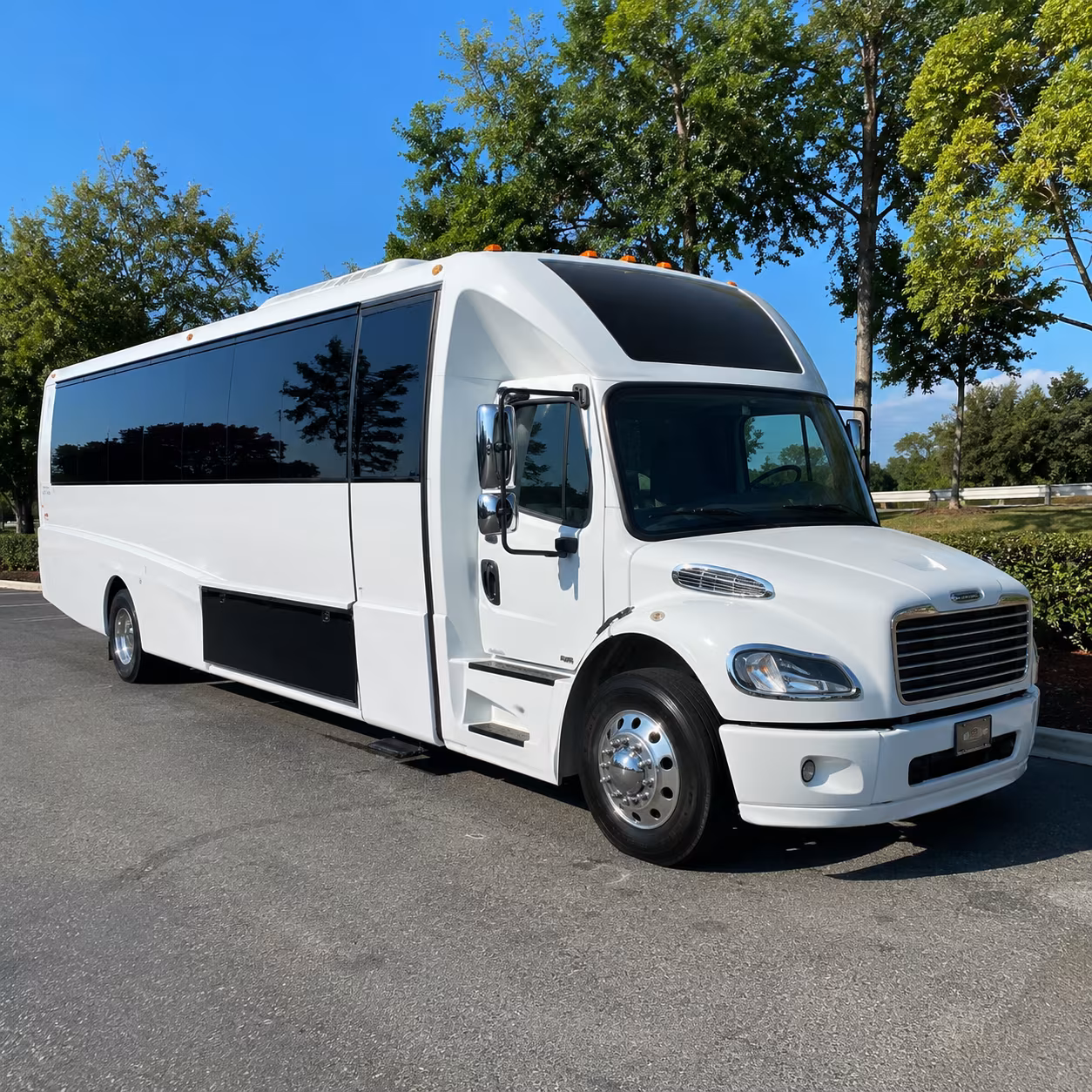 Passenger watching the Overland Park scenery during a regional party bus road trip
