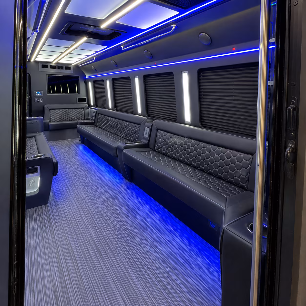 Wedding guests seated inside a party bus serving Overland Park