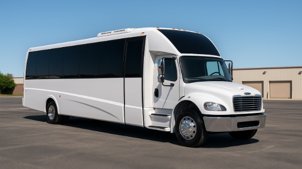Exterior of Charter Bus Company Lenexa's 25 Passenger Party Bus in Lenexa